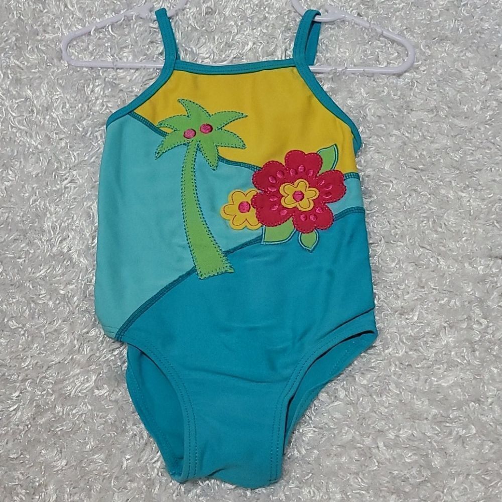 Girls one piece swimsuit palmtree/ flower